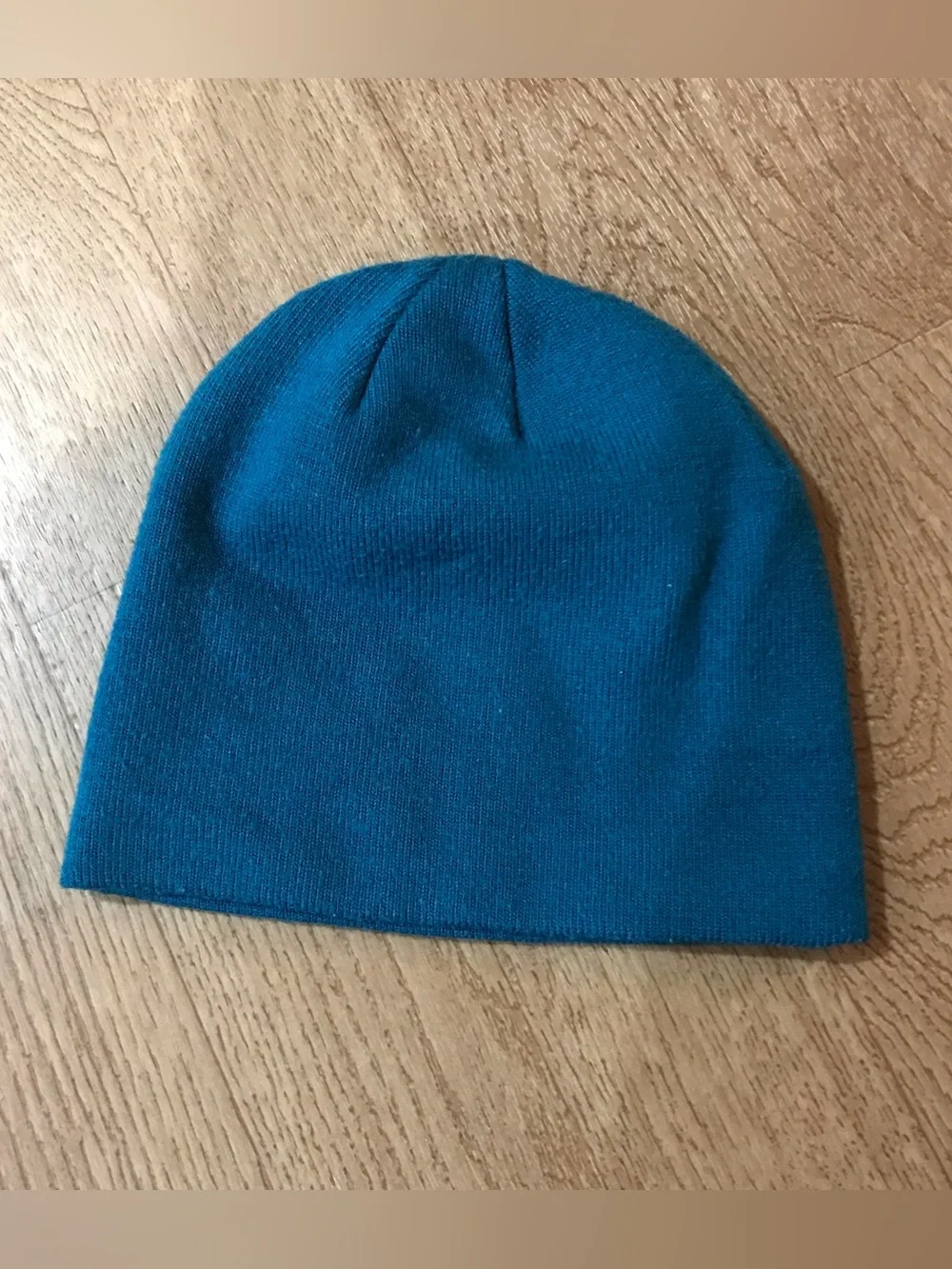 Vintage Oakley blue beanie hat with yellow logo